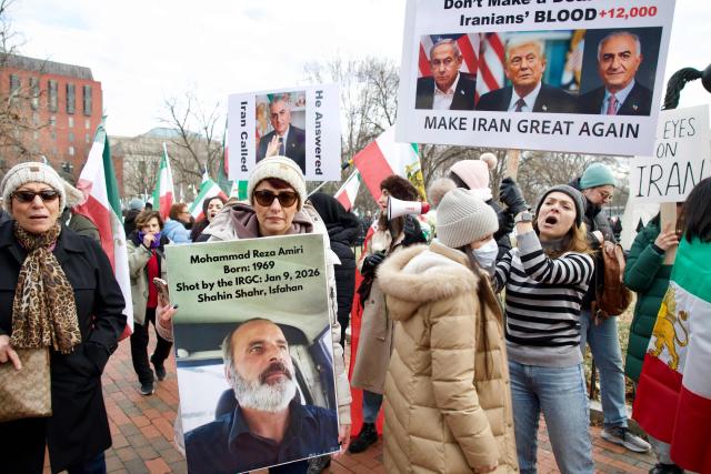 Demonstrators, protesting the deadly crackdown in Iran, rally near the White House in Washington, DC, on January 17, 2026. The United States on January 15 said Iran halted 800 executions of protesters under pressure from President Donald Trump, after Gulf allies appeared to pull him back from military action over Tehran's deadly crackdown on demonstrations. Iran was shaken over the last week by some of the biggest anti-government protests in the history of the Islamic republic, although the demonstrations appear to have diminished over the last few days in the face of repression and a week-long internet blackout. (Photo by Amid FARAHI / AFP)