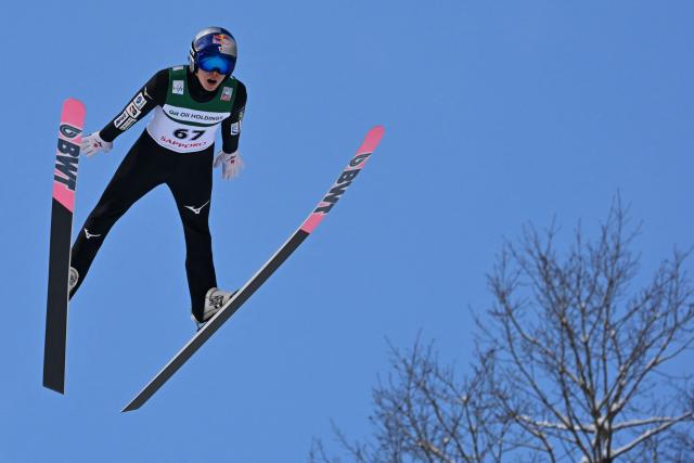Japan's Ryoyu Kobayashi performs his first jump in the individual Large Hill HS137 competition on the third day of men's FIS Ski Jumping World Cup competition in Sapporo on January 18, 2026. (Photo by Toshifumi KITAMURA / AFP)