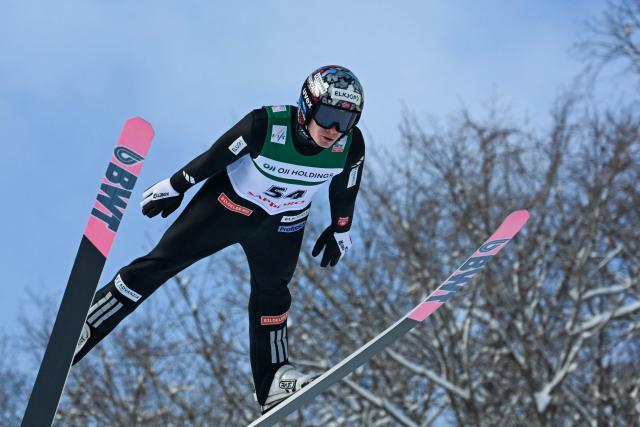 Norway's Marius Lindvik performs his first jump in the individual Large Hill HS137 competition on the third day of men's FIS Ski Jumping World Cup competition in Sapporo on January 18, 2026. (Photo by Toshifumi KITAMURA / AFP)