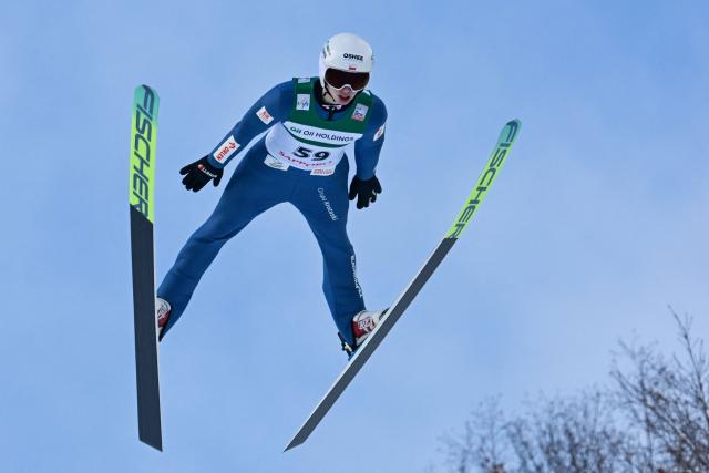 Poland's Kacper Tomasiak performs his first jump in the individual Large Hill HS137 competition on the third day of men's FIS Ski Jumping World Cup competition in Sapporo on January 18, 2026. (Photo by Toshifumi KITAMURA / AFP)