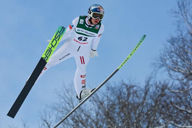 Austria's Stephan Embacher performs his first jump in the individual Large Hill HS137 competition on the third day of men's FIS Ski Jumping World Cup competition in Sapporo on January 18, 2026. (Photo by Toshifumi KITAMURA / AFP)