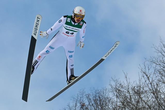 Germany's Philipp Raimund performs his first jump in the individual Large Hill HS137 competition on the third day of men's FIS Ski Jumping World Cup competition in Sapporo on January 18, 2026. (Photo by Toshifumi KITAMURA / AFP)