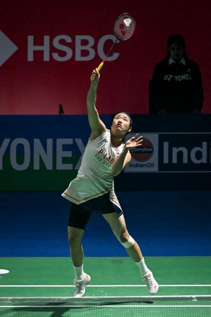South Korea’s An Se-young hits a return during her women's singles final match against China's Wang Zhi Yi at the India Open 2026 badminton tournament in New Delhi on January 18, 2026. (Photo by Sajjad HUSSAIN / AFP)