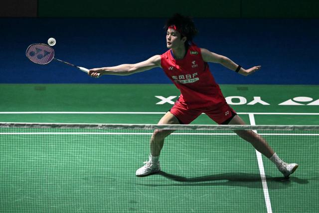 China's Wang Zhi Yi hits a return to South Korea’s An Se-young during their women's singles final match at the India Open 2026 badminton tournament in New Delhi on January 18, 2026. (Photo by Sajjad HUSSAIN / AFP)