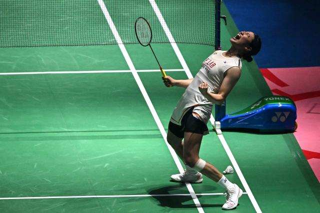 South Korea’s An Se-young celebrates after winning against China's Wang Zhi Yi during their women's singles final match at the India Open 2026 badminton tournament in New Delhi on January 18, 2026. (Photo by Sajjad HUSSAIN / AFP)