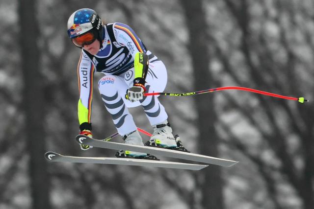 Germany's Emma Aicher competes during the Women's Super G event of FIS Alpine Skiing World Cup in Tarvisio, Italy on January 18, 2026. (Photo by Marco BERTORELLO / AFP)