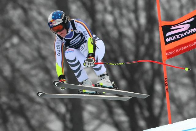 Germany's Emma Aicher competes during the Women's Super G event of FIS Alpine Skiing World Cup in Tarvisio, Italy on January 18, 2026. (Photo by Marco BERTORELLO / AFP)