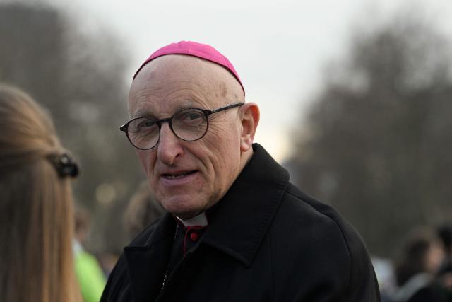 French prelate Dominique Rey looks on during the "Marche pour la Vie" (March for Life) to protest against France's bill for the creation of a right to assited dying, at the Place Vauban, in Paris on January 18, 2026. A major societal reform of France President's second five-year term, the creation of a right to assisted dying will be debated on January 20, 2026, in the Senate, where discussions on end-of-life issues are expected to be less consensual than in the National Assembly, given the reluctance of the right wing. (Photo by Martin LELIEVRE / AFP)