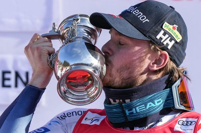 Norway's Atle Lie McGrath celebrates on the podium after winning the men's slalom race of the FIS Alpine Skiing World Cup in Wengen, on January 18, 2026. (Photo by Dimitar DILKOFF / AFP)