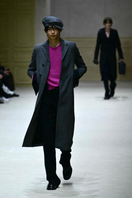 A model walks the runway during the Prada collection show as part of Men's Fall/Winter 2026-2027 Milan's fashion week, on January 18, 2026. (Photo by Stefano RELLANDINI / AFP)