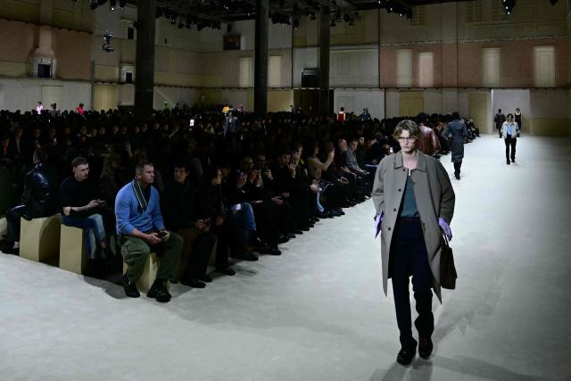 A model walks the runway during the Prada collection show as part of Men's Fall/Winter 2026-2027 Milan's fashion week, on January 18, 2026. (Photo by Stefano RELLANDINI / AFP)