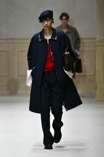 A model walks the runway during the Prada collection show as part of Men's Fall/Winter 2026-2027 Milan's fashion week, on January 18, 2026. (Photo by Stefano RELLANDINI / AFP)