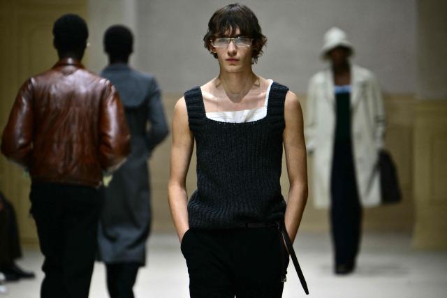 A model walks the runway during the Prada collection show as part of Men's Fall/Winter 2026-2027 Milan's fashion week, on January 18, 2026. (Photo by Stefano RELLANDINI / AFP)