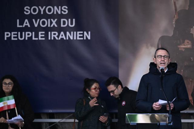 President of Les Republicains (LR) right wing party Bruno Retailleau delivers remarks during the March for Iran rally in support of the Iranian people, called by pro-royalists and supporters of the son of the last shah of Iran Mohammad Reza Pahlavi at the Place Victor Hugo, in Paris on January 18, 2026. (Photo by JULIEN DE ROSA / AFP)