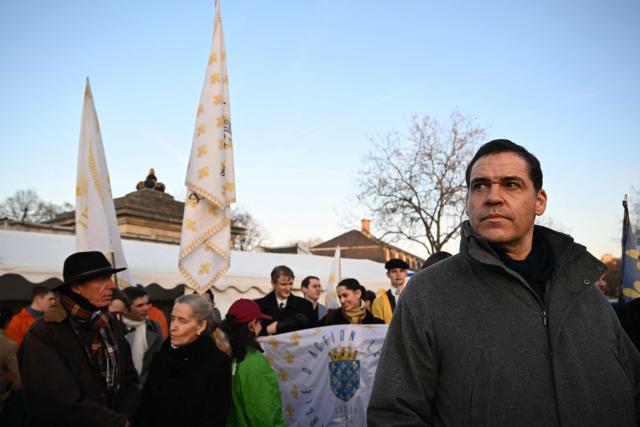 Prince Louis Alphonse de Bourbon, Duke of Anjou, takes part in the "Marche pour la Vie" (March for Life) to protest against France's bill for the creation of a right to assisted dying, near Place Vauban, in Paris on January 18, 2026. A major societal reform of France President's second five-year term, the creation of a right to assisted dying will be debated on January 20, 2026, in the Senate, where discussions on end-of-life issues are expected to be less consensual than in the National Assembly, given the reluctance of the right wing. (Photo by Martin LELIEVRE / AFP)
