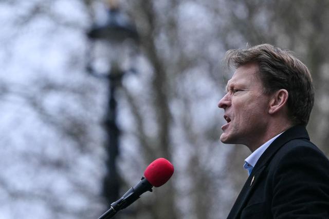Reform UK party deputy leader Richard Tice addresses demonstrators after they marched to Downing Street to protest against Iran's crackdown on protesters, in London on January 18, 2026. (Photo by JUSTIN TALLIS / AFP)