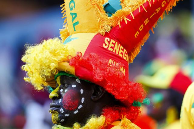 A Senegal fan waits for the start of the Africa Cup of Nations (CAN) final football match between Senegal and Morocco at the Prince Moulay Abdellah Stadium in Rabat on January 18, 2026. (Photo by FRANCK FIFE / AFP)