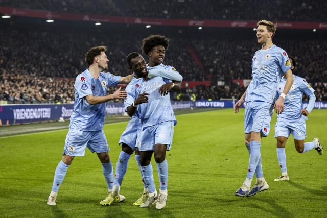 Sparta Rotterdam's Joshua Kitolano (2ndL) is congratulated by teammates after scoring a goal during the Dutch Eredivisie football match between Feyenoord and Sparta Rotterdam at Feyenoord Stadion de Kuip in Rotterdam on January 18, 2026. (Photo by Bart Stoutjesdijk / ANP / AFP) / Netherlands OUT
