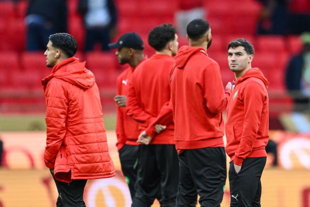 Morocco's forward #10 Brahim Diaz (R) arrives with teammates prior the Africa Cup of Nations (CAN) final football match between Senegal and Morocco at the Prince Moulay Abdellah Stadium in Rabat on January 18, 2026. (Photo by SEBASTIEN BOZON / AFP)