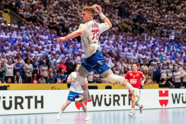 Faroes' left back #78 Oli Mittun throws the ball during the men's EHF Euro 2026 preliminary round handball match Montenegro vs Faroe Islands in Oslo, Norway, on January 18, 2026. (Photo by Cornelius Poppe / NTB / AFP) / Norway OUT