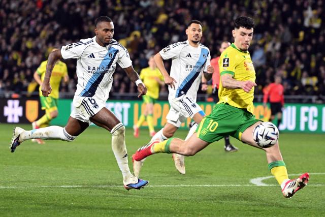 Nantes' French forward #10 Matthis Abline scores a goal during the French L1 football match between FC Nantes and Paris FC at the Stade de la Beaujoire–Louis Fonteneau in Nantes, western France, on January 18, 2026. (Photo by Sebastien Salom-Gomis / AFP)