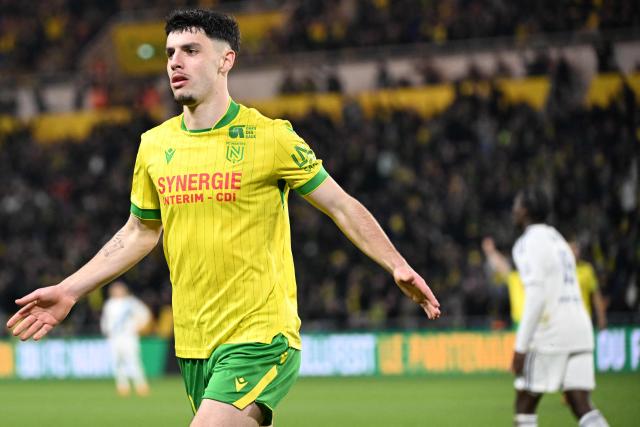 Nantes' French forward #10 Matthis Abline celebrates after scoring a goal during the French L1 football match between FC Nantes and Paris FC at the Stade de la Beaujoire–Louis Fonteneau in Nantes, western France, on January 18, 2026. (Photo by Sebastien Salom-Gomis / AFP)