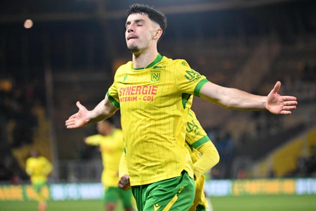 Nantes' French forward #10 Matthis Abline celebrates after scoring a goal during the French L1 football match between FC Nantes and Paris FC at the Stade de la Beaujoire–Louis Fonteneau in Nantes, western France, on January 18, 2026. (Photo by Sebastien Salom-Gomis / AFP)