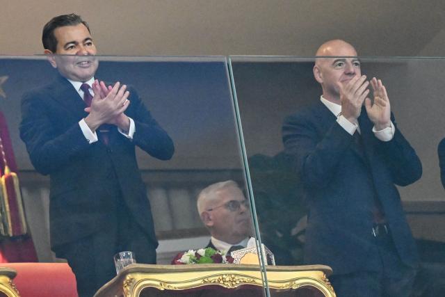 Prince Moulay Rachid of Morocco and FIFA President Gianni Infantino attend the opening ceremony of the Africa Cup of Nations (CAN) final football match between Senegal and Morocco at the Prince Moulay Abdellah Stadium in Rabat on January 18, 2026. (Photo by SEBASTIEN BOZON / AFP)