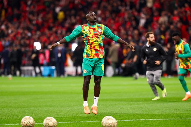 Senegal's forward #10 Sadio Mane warms up before the start of the Africa Cup of Nations (CAN) final football match between Senegal and Morocco at the Prince Moulay Abdellah Stadium in Rabat on January 18, 2026. (Photo by FRANCK FIFE / AFP)