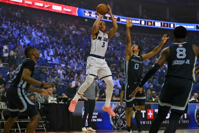 Orlando Magic’s US shooting guard #03 Desmond Bane shoots during the 2025/2026 NBA season basketball match between the Memphis Grizzlies and Orlando Magic at the O2 Arena in London on January 18, 2026. (Photo by Glyn KIRK / AFP)