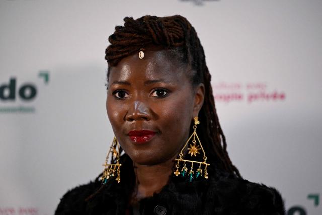 French-Senegalese director Alice Diop poses during the photocall of the 29th 'Ceremonie des Lumieres' cinema awards ceremony at the Institut du Monde Arabe (IMA) in Paris on January 18, 2026. (Photo by Martin LELIEVRE / AFP)