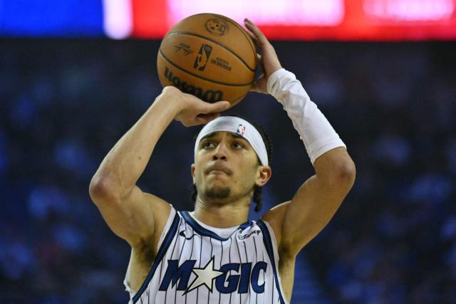 Orlando Magic’s US point guard #00 Anthony Black takes a free throw during the 2025/2026 NBA season basketball match between the Memphis Grizzlies and Orlando Magic at the O2 Arena in London on January 18, 2026. (Photo by Glyn KIRK / AFP)