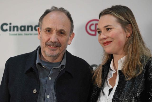 French film director Yannick Kergoat (L) and French movie producer Gabrielle Juhel pose during the photocall of the 29th 'Ceremonie des Lumieres' cinema awards ceremony at the Institut du Monde Arabe (IMA) in Paris on January 18, 2026. (Photo by Martin LELIEVRE / AFP)