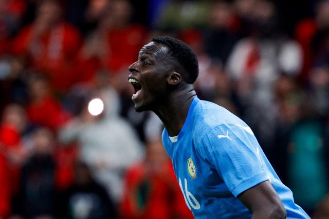 Senegal's goalkeeper #16 Edouard Mendy shouts instructions to his teammates during the Africa Cup of Nations (CAN) final football match between Senegal and Morocco at the Prince Moulay Abdellah Stadium in Rabat on January 18, 2026. (Photo by Abdel Majid BZIOUAT / AFP)