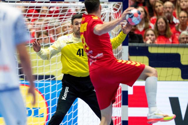 Portugal's goalkeeper #41 Gustavo Capdeville (C) is pictured during the men's EHF Euro 2026 preliminary round group B handball match North Macedonia vs Portugal in Herning, Denmark, on January 18, 2026. (Photo by Bo Amstrup / Ritzau Scanpix / AFP) / Denmark OUT
