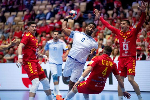 Portugal's pivot #08 Victor Iturriza (C) vies for the ball with North Macedonia's right winger #19 Nenad Kosteski (R), North Macedonia's right back #04 Martin Velkovski (2nd R) and North Macedonia's pivot #42 Marko Stojkovikj during the men's EHF Euro 2026 preliminary round group B handball match North Macedonia vs Portugal in Herning, Denmark, on January 18, 2026. (Photo by Bo Amstrup / Ritzau Scanpix / AFP) / Denmark OUT