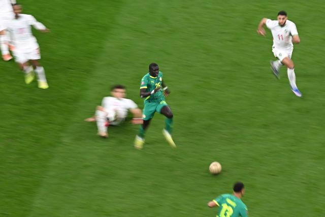 Senegal's defender #25 El Hadji Malick Diouf runs with the ball during the Africa Cup of Nations (CAN) final football match between Senegal and Morocco at the Prince Moulay Abdellah Stadium in Rabat on January 18, 2026. (Photo by Paul ELLIS / AFP)