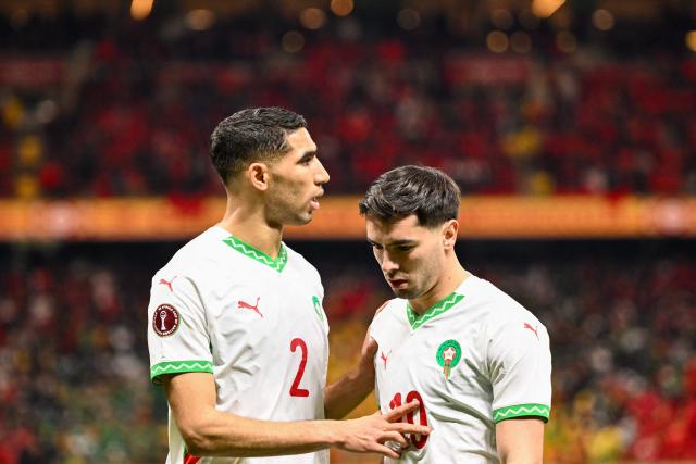 Morocco's defender #02 Achraf Hakimi and Morocco's forward #10 Brahim Diaz react during the Africa Cup of Nations (CAN) final football match between Senegal and Morocco at the Prince Moulay Abdellah Stadium in Rabat on January 18, 2026. (Photo by SEBASTIEN BOZON / AFP)