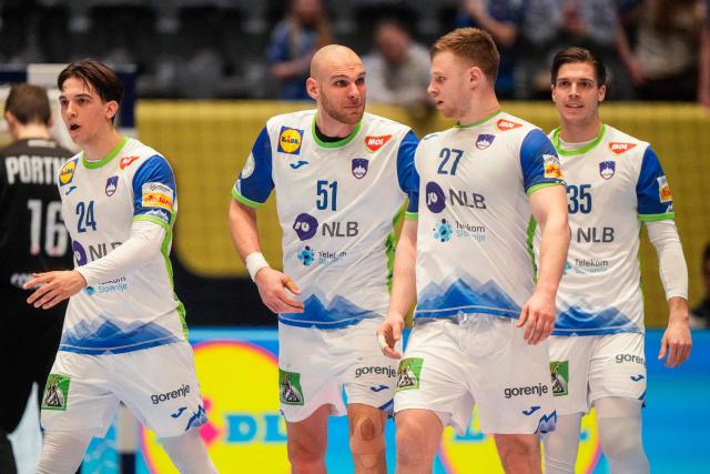 (L-R) Slovenia's wing #24 Andraz Makuc, Slovenia's left back #51 Borut Mackovsek, Slovenia's pivot #27 Kristjan Horzen and Slovenia's centre back #35 Domen Makuc are pictured during the men's EHF Euro 2026 preliminary round handball match Switzerland vs Slovenia in Oslo, Norway, on January 18, 2026. (Photo by Cornelius Poppe / NTB / AFP) / Norway OUT