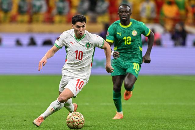 Morocco's forward #10 Brahim Diaz and Senegal's forward #10 Sadio Mane vie during the Africa Cup of Nations (CAN) final football match between Senegal and Morocco at the Prince Moulay Abdellah Stadium in Rabat on January 18, 2026. (Photo by SEBASTIEN BOZON / AFP)