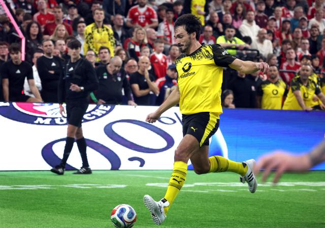 Borussia Dortmund's Mats Hummels runs with the ball during the Legends Cup in the SAP Garden in Munich, southern Germany on January 18, 2026. (Photo by Karl-Josef HILDENBRAND / AFP)