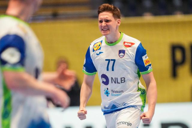 Slovenia's right winger #77 Domen Novak reacts during the men's EHF Euro 2026 preliminary round handball match Switzerland vs Slovenia in Oslo, Norway, on January 18, 2026. (Photo by Cornelius Poppe / NTB / AFP) / Norway OUT