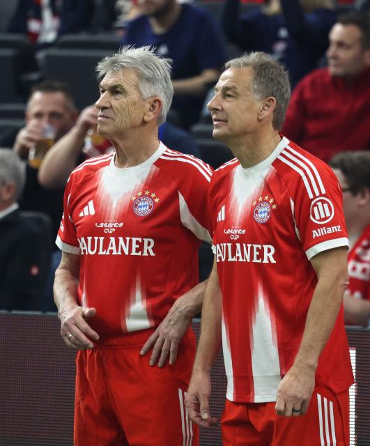 Bayern Munich's Klaus Augenthaler (L) and Juergen Klinsmann are pictured at the beginning of the Legends Cup in the SAP Garden in Munich, southern Germany on January 18, 2026. (Photo by Karl-Josef HILDENBRAND / AFP)