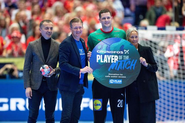 Denmark's goalkeeper Kevin Moeller (2nd R) is named the player of the match after the men's EHF Euro 2026 preliminary round group B handball match Romania vs Denmark in Herning, Denmark, on January 18, 2026. (Photo by Bo Amstrup / Ritzau Scanpix / AFP) / Denmark OUT