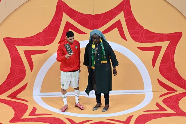 Morocco's defender #02 Achraf Hakimi poses with the Fair Play Team award after the Africa Cup of Nations (CAN) final football match between Senegal and Morocco at the Prince Moulay Abdellah Stadium in Rabat on January 18, 2026. (Photo by Paul ELLIS / AFP)