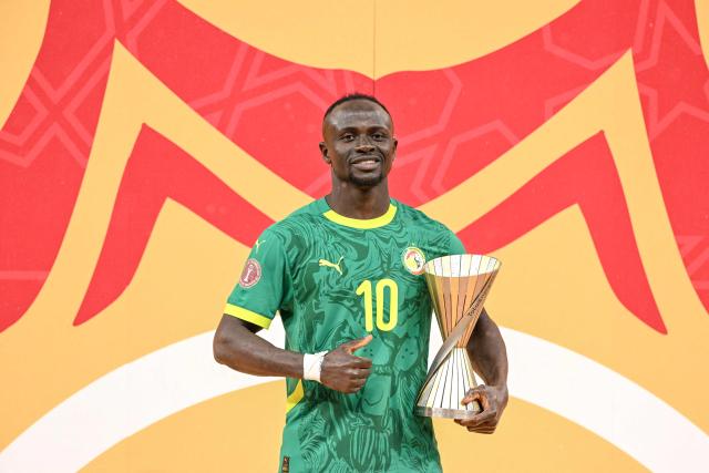 Senegal's forward #10 Sadio Mane poses with the Man of the Competition award after the Africa Cup of Nations (CAN) final football match between Senegal and Morocco at the Prince Moulay Abdellah Stadium in Rabat on January 18, 2026. (Photo by SEBASTIEN BOZON / AFP)