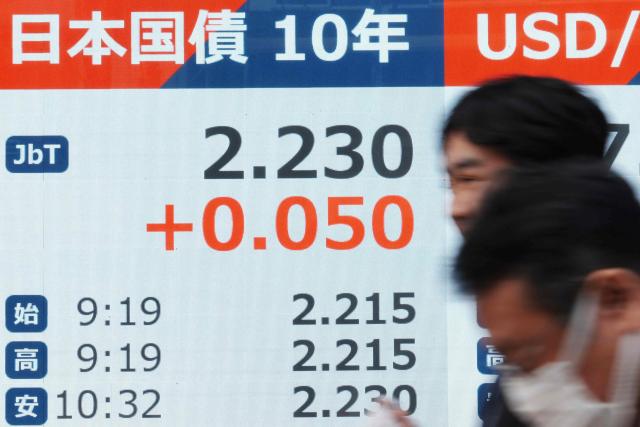 An electronic quotation board displays 10-year government bonds, an index of long-term interest rates on the Tokyo bond market, in Tokyo on January 19, 2026. (Photo by Kazuhiro NOGI / AFP)