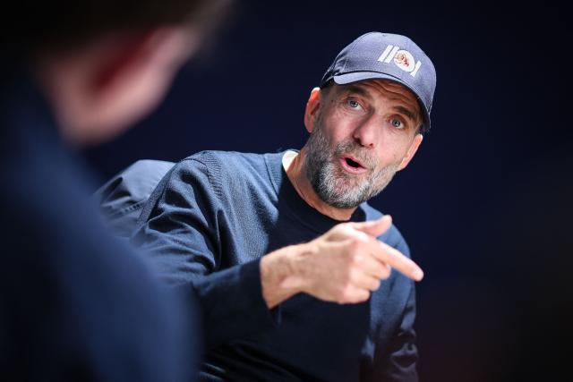 Jurgen Klopp, German football coach and "Global Head of Soccer" at Red Bull, is pictured during an AFP interview at RB Leipzig's headquarters in Leipzig, eastern Germany, on January 17, 2026. Despite leaving Liverpool as one of the most highly regarded coaches in football in 2024, Jurgen Klopp said he never considered himself among the game's best. (Photo by Ronny HARTMANN / AFP)