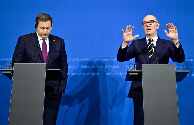 German Finance Minister and Vice Chancellor Lars Klingbeil (L) and French Minister of the Economy, Finance, and Industrial, Energy, and Digital Sovereignty Roland Lescure give a joint statement on January 19, 2026 in Berlin. (Photo by John MACDOUGALL / AFP)