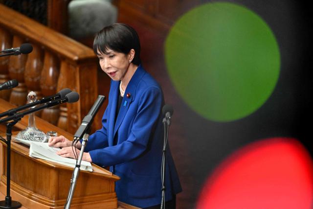 (FILES) Japan's Prime Minister Sanae Takaichi delivers a speech at the House of Representatives plenary session in Tokyo on October 24, 2025. Takaichi said on January 19, 2026 she wanted to ask the public if she is 'fit' to be premier after announcing plans to dissolve parliament for a snap election. (Photo by Kazuhiro NOGI / AFP)